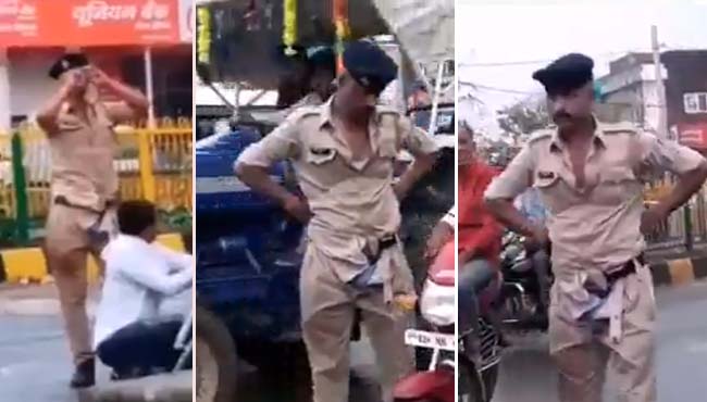 police-men-Drink-alcohol-on-the-mid-road-caught-in-camera