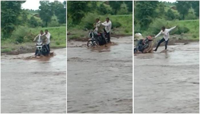 नदी के तेज बहाव में मोटर साइकिल सहित बहा युवक, देखें वीडियो