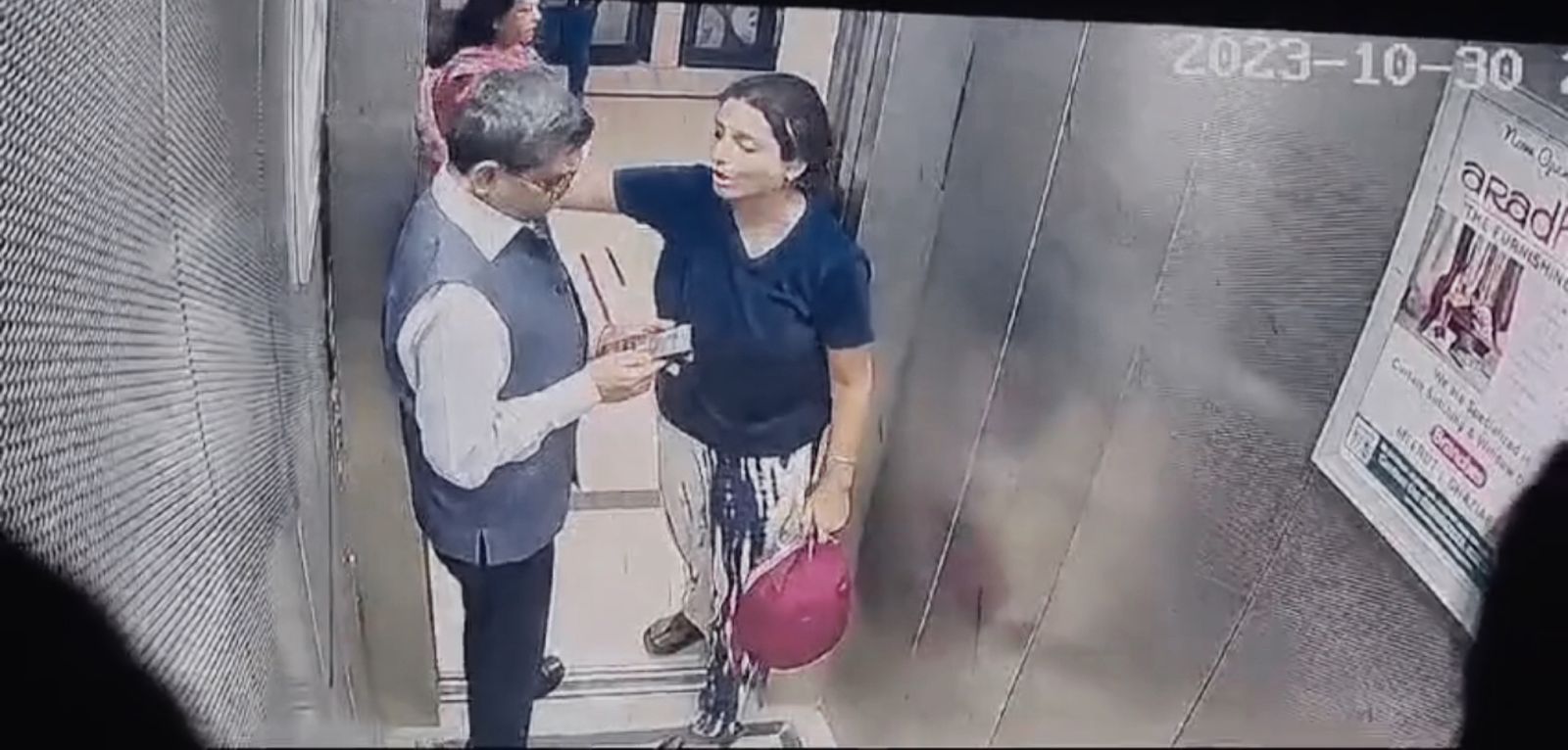 Controversy over taking dog in lift in Noida