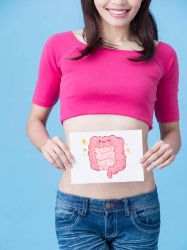 woman with health intestine concept on the blue background