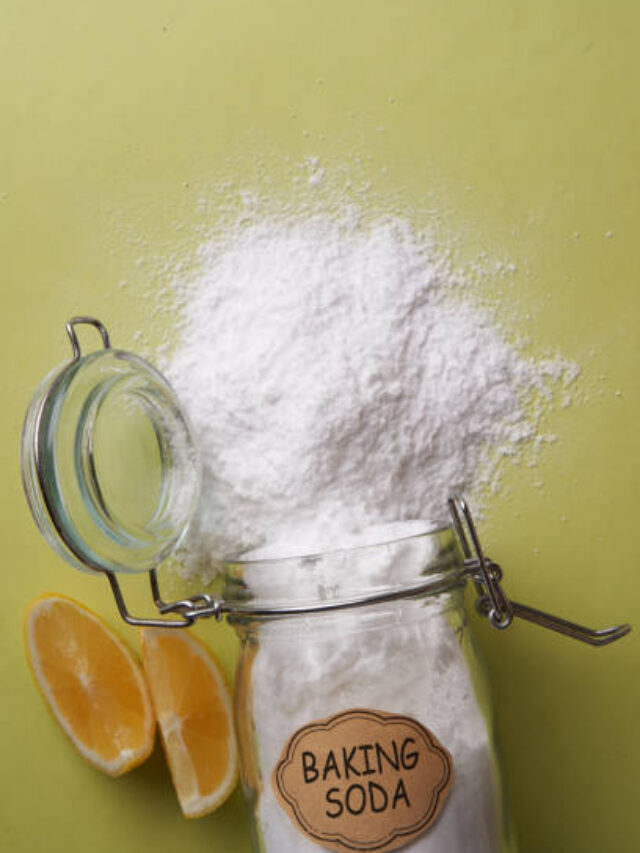 directly above jar of baking soda on the green background